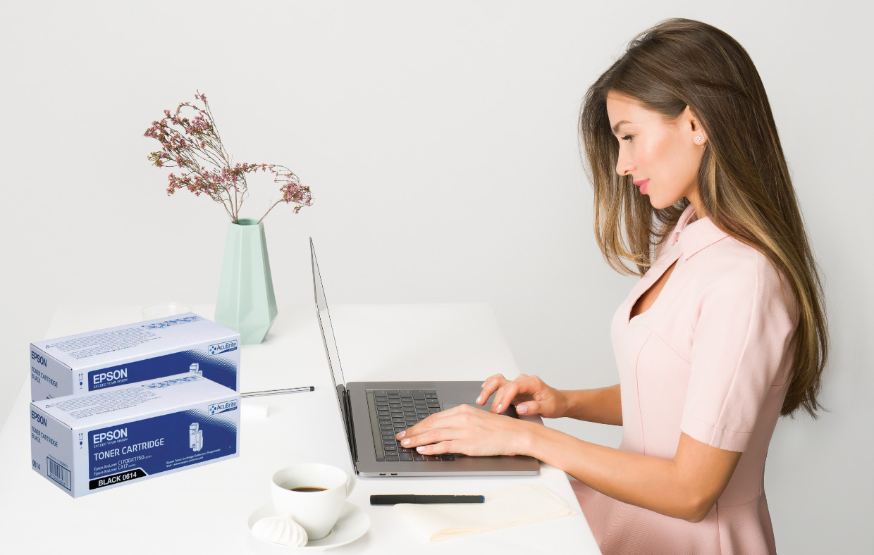 Women sitting and using Laptop